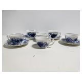Ten piece white china demi tasse cups and saucers