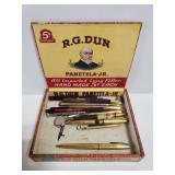 Cigar box with old pens