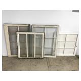 Four vintage wood framed windows