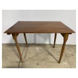 Small antique table with folding legs
