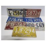 Vintage mismatched license plate collection