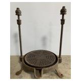 Old cast iron kettle stand