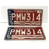 Two matching 1976 red white & blue license plates