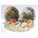 Shell decor piece with plaster base