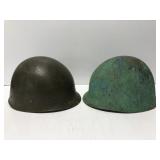 Two Vietnam era fiberglass combat helmets