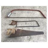 Three large hand saws