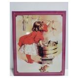 Girl hanging laundry metal sign