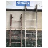 Two cut old wood ladder sections