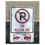Nixon Rd. No Parking Towing genuine street sign