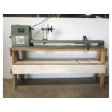 Large wood turning lathe on custom bench