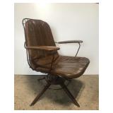 Mid century modern brown metal swivel chair