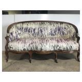 Vintage wood settee sofa on caster wheels