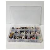 Divided storage tray with buttons