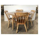 Round wood table and chair set with leaves
