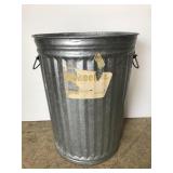Galvanized metal trash can