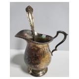 Silver spoon and creamer