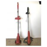 Two electric lawn trimmers