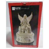 Musical ivory bisque guardian angel