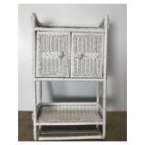 White wicker wall shelf