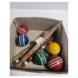 Vintage croquet balls and stakes