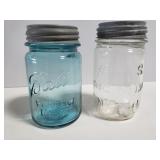Two vintage mason jars with metal lids