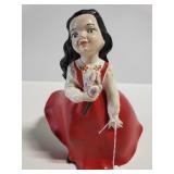 Girl in red dress coin bank
