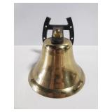 Small brass dinner bell w/ cast iron bracket