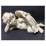 Resin lounging angel statue