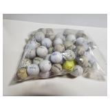 Large assortment of golf balls