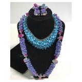 Brightly beaded costume jewelry necklaces