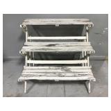 Distressed white wood tiered step shelf display