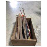 Vintage fishing tip ups & poles in old crate