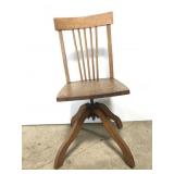 Vintage swiveling wood child