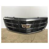Cadillac automobile grill - minor damage
