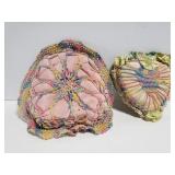 Two small crocheted pillows