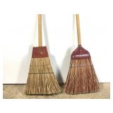 Two railroad brooms