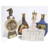 Four vintage whiskey decanters