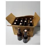 Carton of 12 brown glass swing top bottles