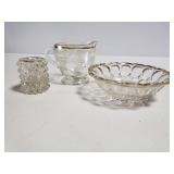 Three glass dishes with gold trim design