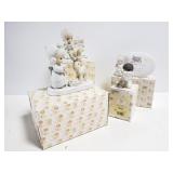 Four Precious moments figurines