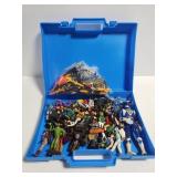 Collection of toy action figures and weapons