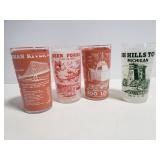Four frosted glass souvenir drinking glasses