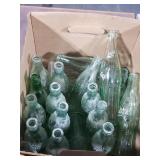 Collection of glass CocaCola bottles