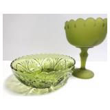 Two green glass dishes
