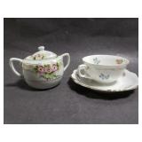 Sugar bowl and teacup with saucer