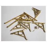 Gold toned aluminum shelving brackets