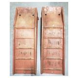 Set of of red steel car ramps
