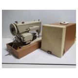 Singer sewing maching in carry case
