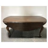 Drop leaf dark wood coffee table