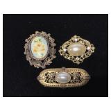 Vintage brooch trio